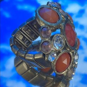 Multi colored costume stone and gold stretch ring